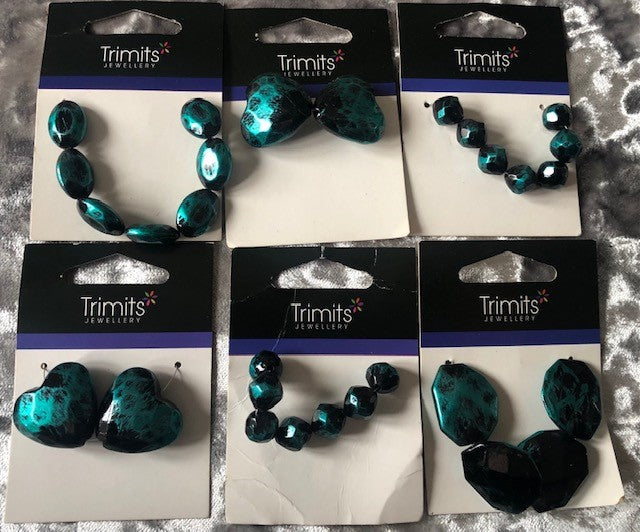 Assorted Trimit Beads in various shapes and sizes in aqua (6 packs)